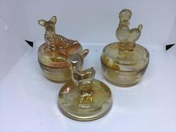 Two luster dresser jars, extra lid