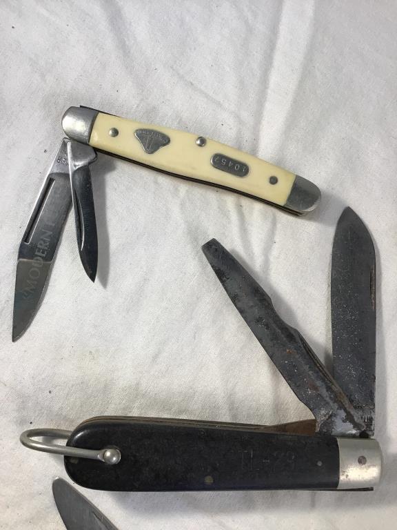 5 pocket knives.  Boker black gold, Beaver Creek,