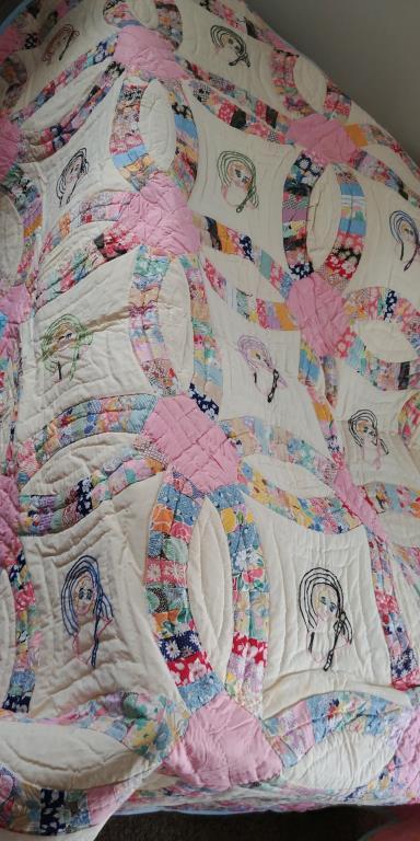 Hand stitched embroidered quilt.  Full size,