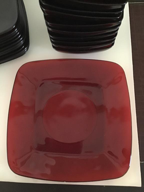 14 Ruby red plates and 10 berry bowls.