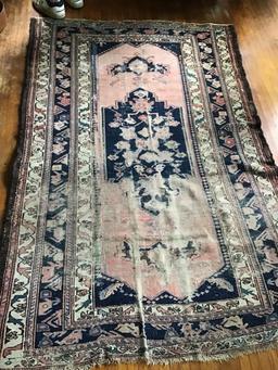 Oriental rug.  54 x 81 hand knotted.  Shows