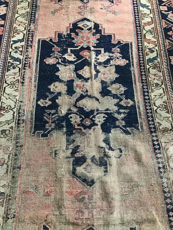 Oriental rug.  54 x 81 hand knotted.  Shows
