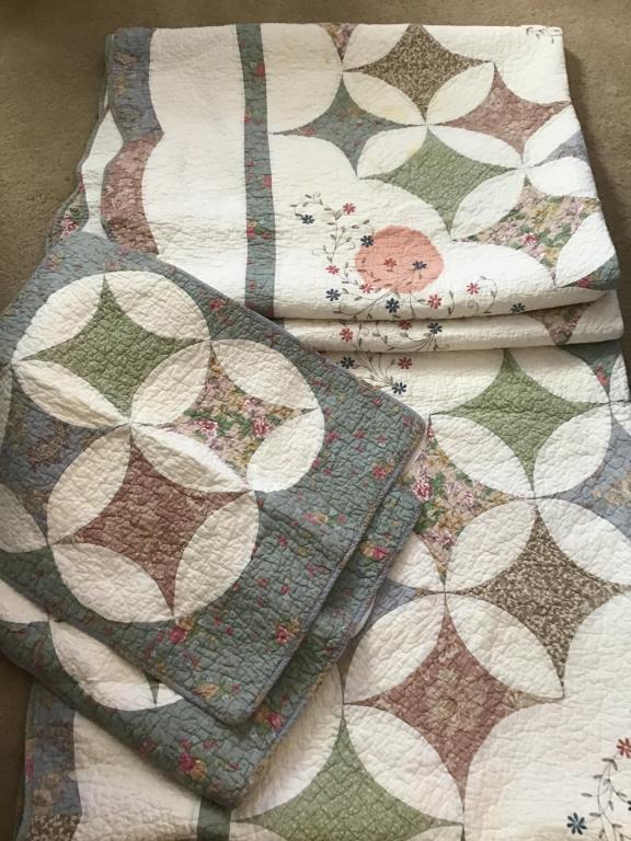 2 twin sized quilts with shams one stained