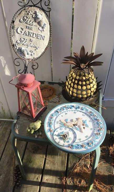 Glass top table with patio items