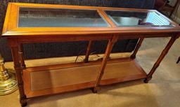 Glass and rattan. 52 inch sofa table