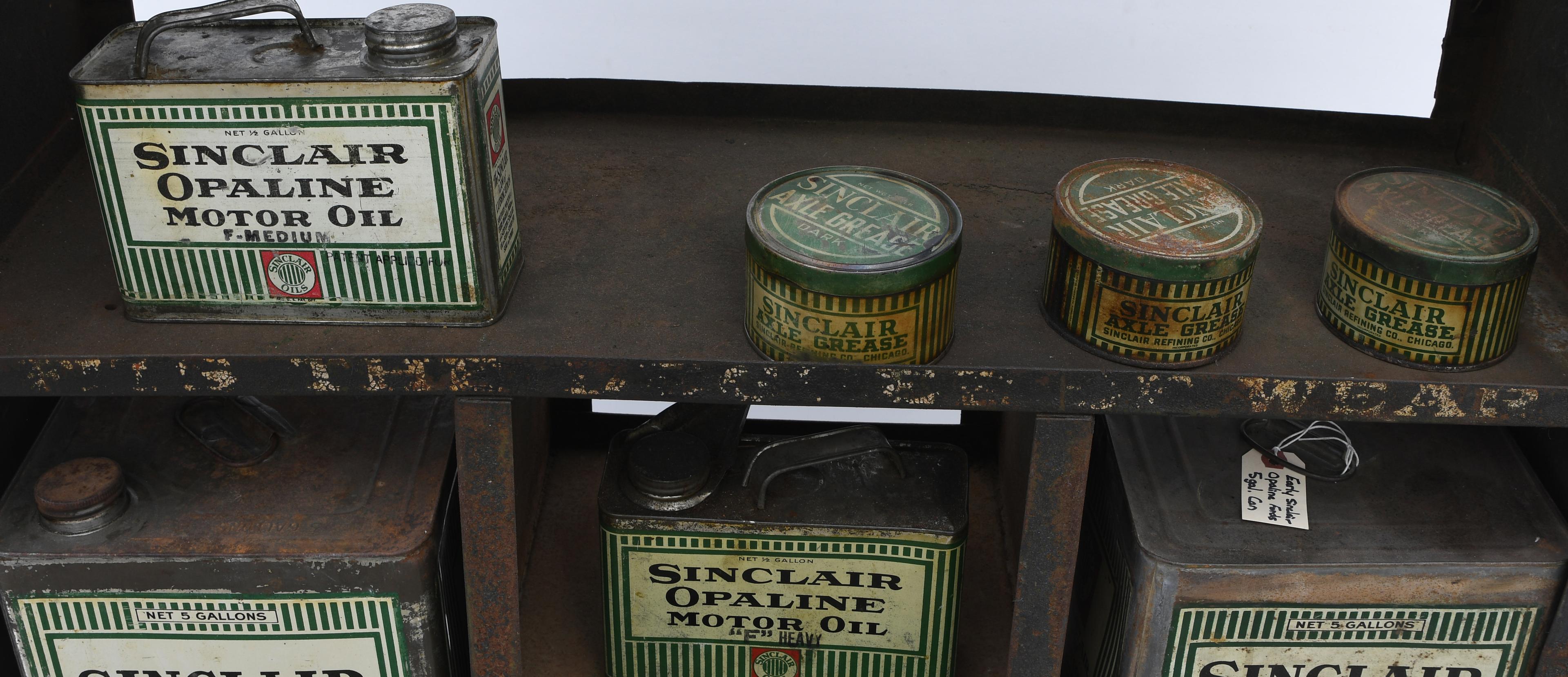 Early Sinclair Opaline Cart With 12 Cans