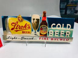 Lot of two Strogh's and Coca Cola Signs