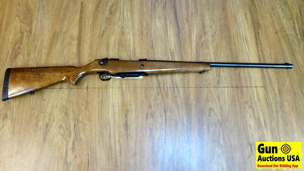 Mossberg 585 20 ga. Bolt Action Shotgun. Very Good. 25" Barrel. Shiny Bore, Tight Action Magazine Fe