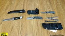 Buck, Leatherman Knives. Very Good. Lot of 4 Knives, One Folding, 2 Sheaths and one Leatherman.. (43