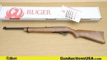 Ruger 10-22 .22 LR Rifle. New In Box. 18.5" Barrel. Features a Front Blade Sight, Flip up Notch Rear