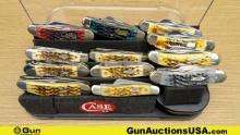 Case Knives. Like New. Lot of 12; Pocket Knives in Display Case.. (67736)