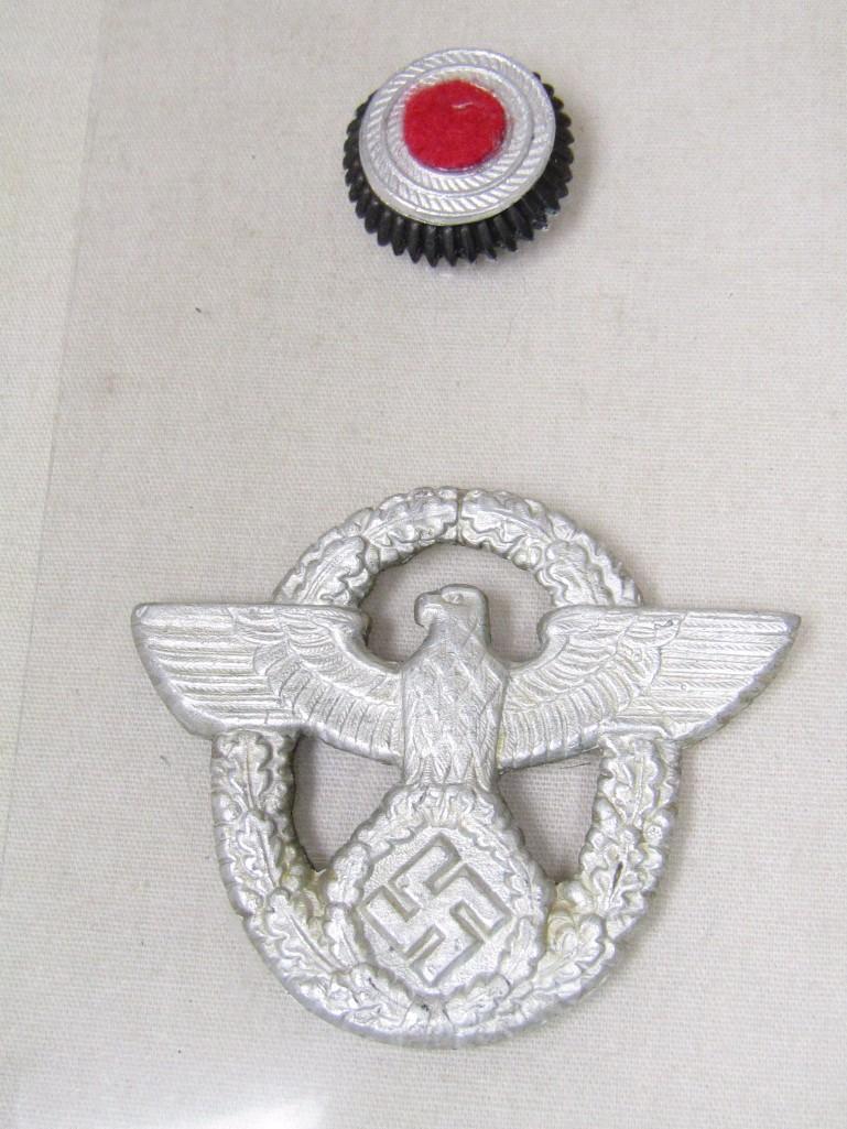 Group of TWO Hat badges for the German WWII Third Reich period Police Visor hat.