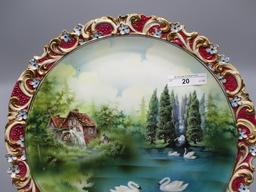 Pair of RS Prussia 12" scenic plaques. First is a Snowbirds scenic plaque a