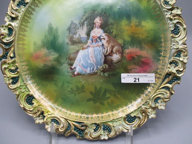 RS Prussia 10" plaque w/ Lady & Dog decor. Border has embossed floral in re