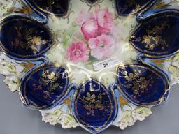 RS Prussia 10.5" Violet mold floral bowl w/ cobalt domes and Poppy flowers.