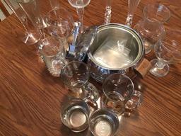 Ice Bucket w/ several glasses and 4 plastic wine glasses