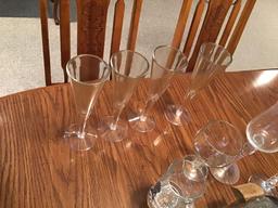 Ice Bucket w/ several glasses and 4 plastic wine glasses