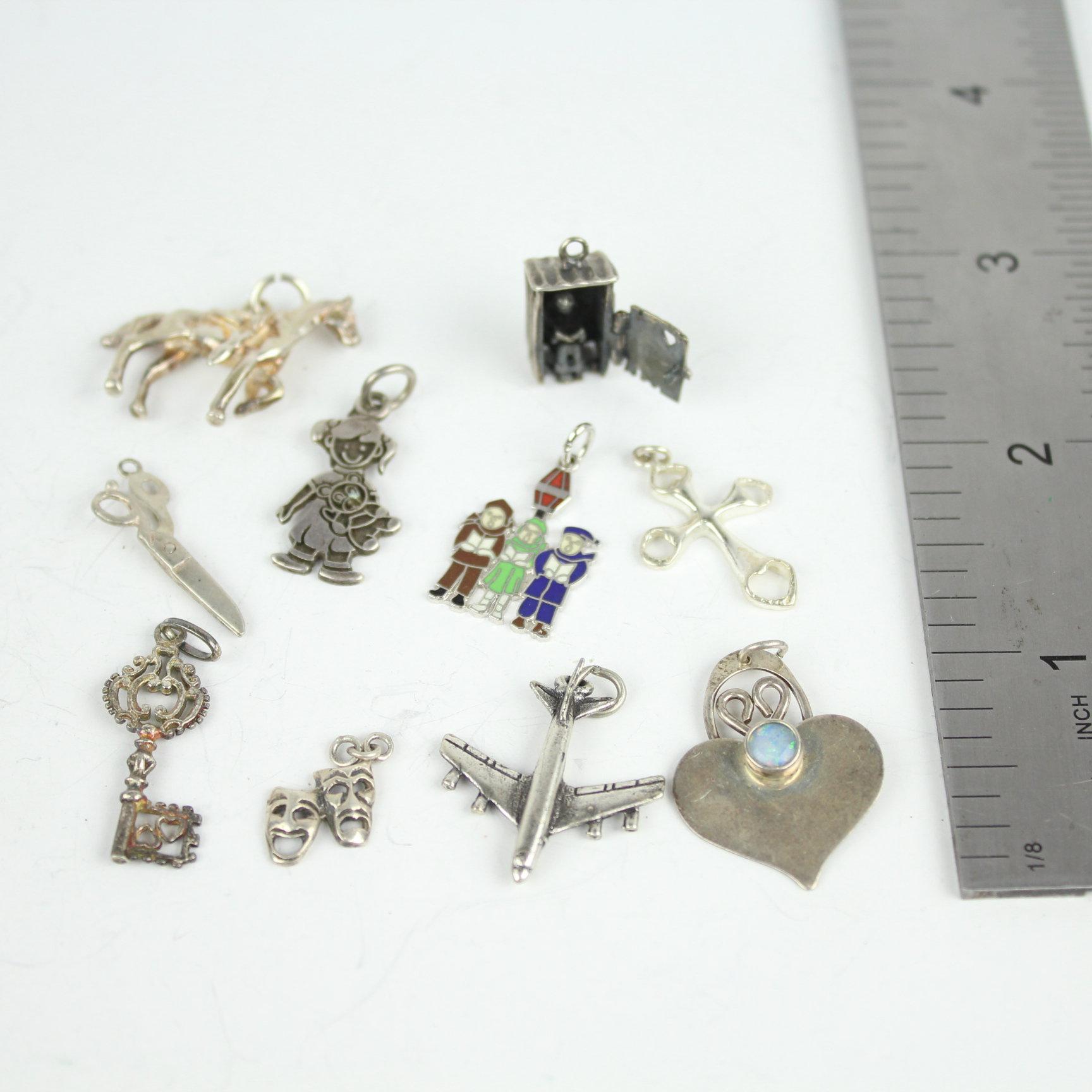 Group of Sterling Silver Charms 18 Grams