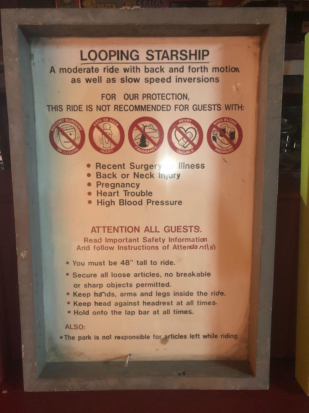 Looping Starship ride instructional safety sign