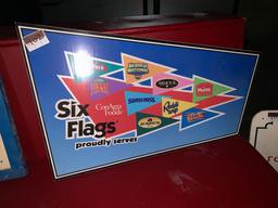 Six Flags Proudly Serves Sign