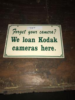 Forget your camera? 8in x 1ft 1/2in plastic sign