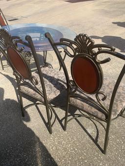 Glass and iron dinette set