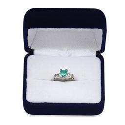 Platinum Setting with 0.58ct Emerald and 0.15ct Diamond Ladies Ring