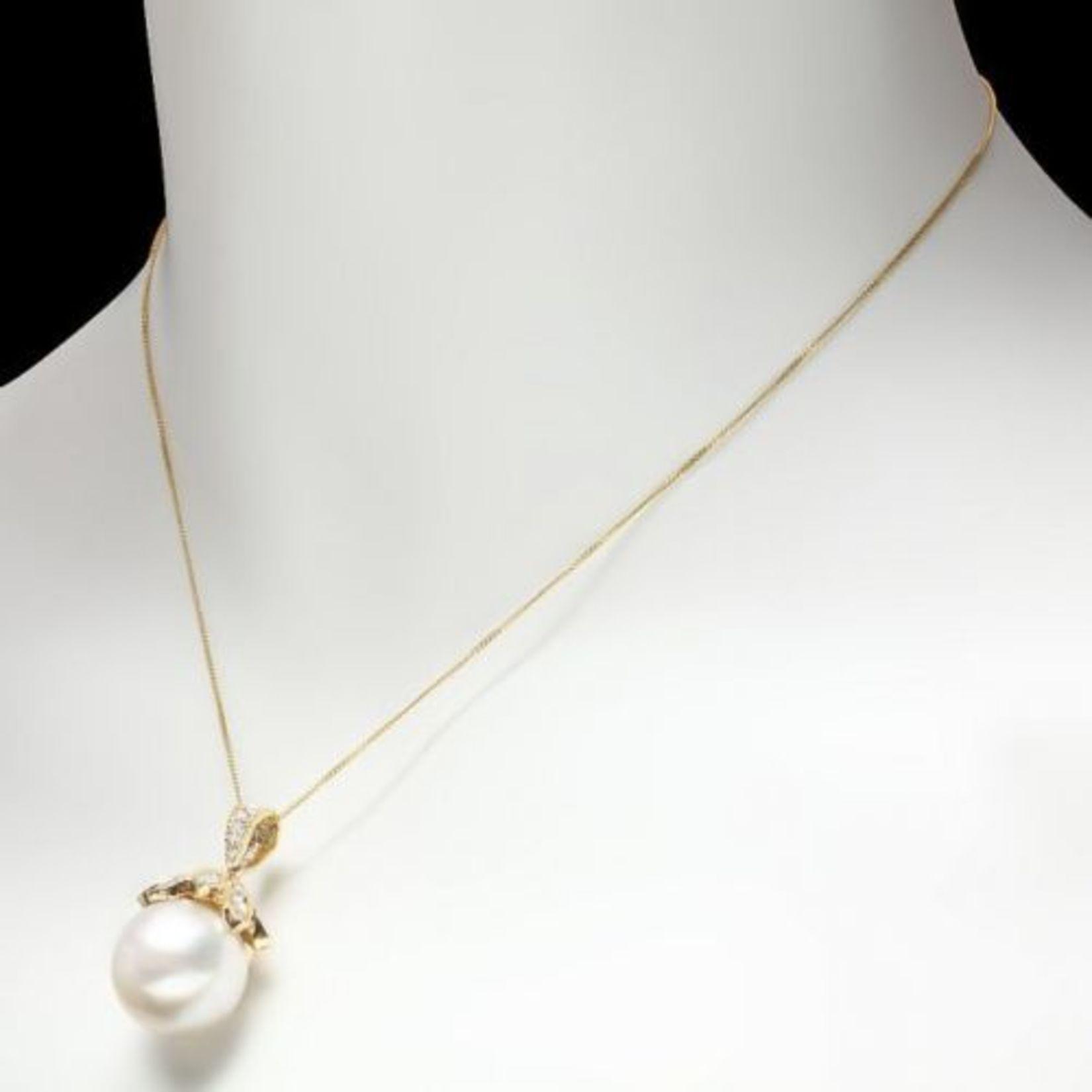 14K Gold 16MM Pearl 1.25ct Diamond Pendant