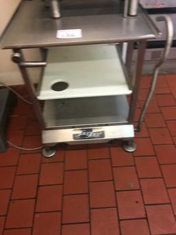 Stainless steel slicer table on casters