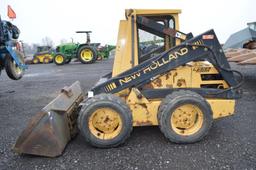 NH 555 skid loader w/ 72" bucket, 1,931 original hours, Kubota diesel, 10-1