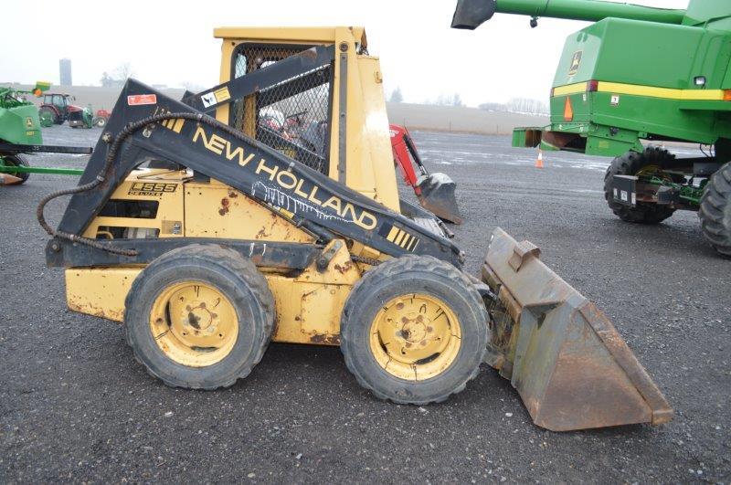 NH 555 skid loader w/ 72" bucket, 1,931 original hours, Kubota diesel, 10-1