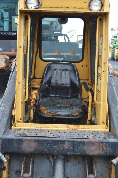 NH 555 skid loader w/ 72" bucket, 1,931 original hours, Kubota diesel, 10-1