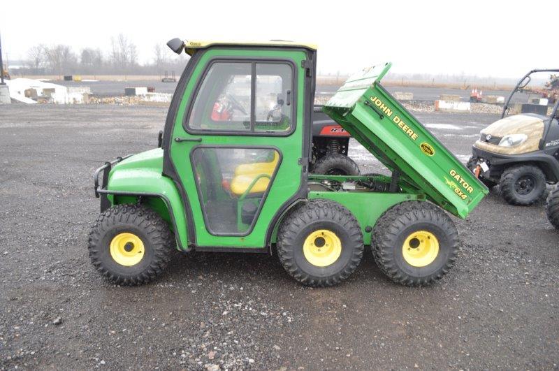 JD 6x4 Gator w/ 4wd, Curtis cab, 1,050 hrs, 4wd, electric dump