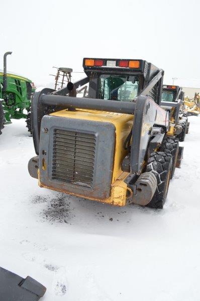 NH LS190 B skidloader w/ 2,390 hrs, 2 speed, cab-heat, rear weights, 12-16.