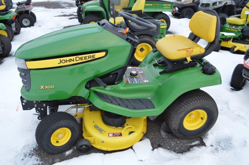 JD X300 lawn mower w/ 42" deck, 660 hrs, hydro (nice)