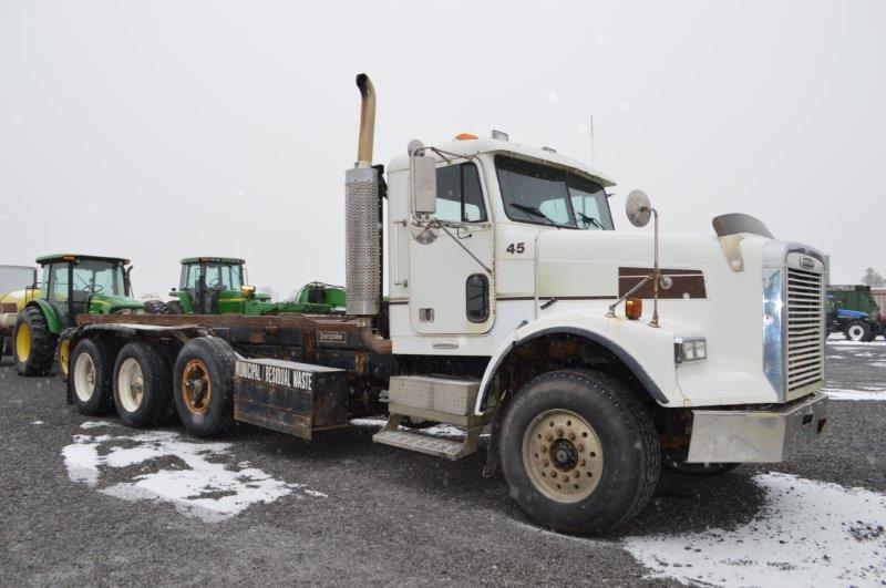 '97 Freightliner w/ dumping rolloff, Bempster dump body, Cummins M14 425HP