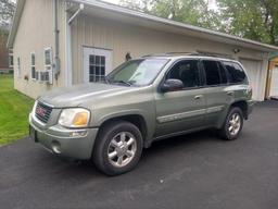 '03 GMC Envoy SLT SUV w/ 175,000 miles, sun roof, leather seats, V6 motor, power controls, tow packa