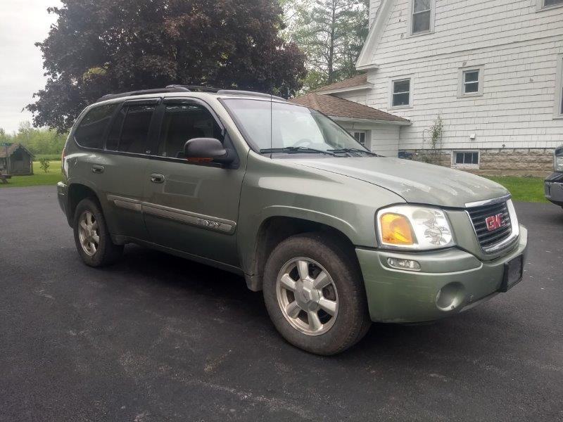 '03 GMC Envoy SLT SUV w/ 175,000 miles, sun roof, leather seats, V6 motor, power controls, tow packa