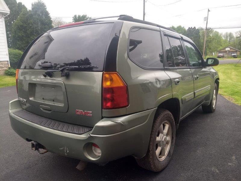 '03 GMC Envoy SLT SUV w/ 175,000 miles, sun roof, leather seats, V6 motor, power controls, tow packa