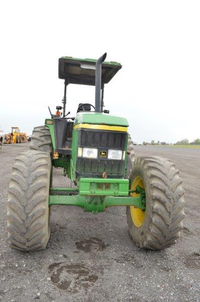 JD 7210 tractor w/ 18.4-38 rear tires, open station