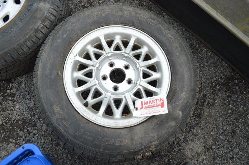 P215/70R15 tire on rim