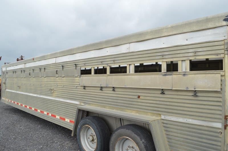 '06 Southern Classic goosneck cattle trailer w/ 3 gates, left & rear doors, 215/75R17.5 tires, 16,00