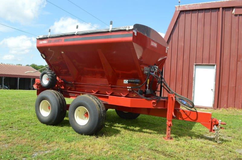 Salford PTPG 8 ton Salford/BBI Stainless Liberty fertilizer spreader w/ roll tarp, hyd & wheel drive