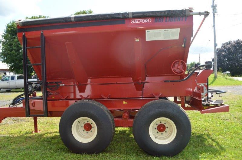 Salford PTPG 8 ton Salford/BBI Stainless Liberty fertilizer spreader w/ roll tarp, hyd & wheel drive