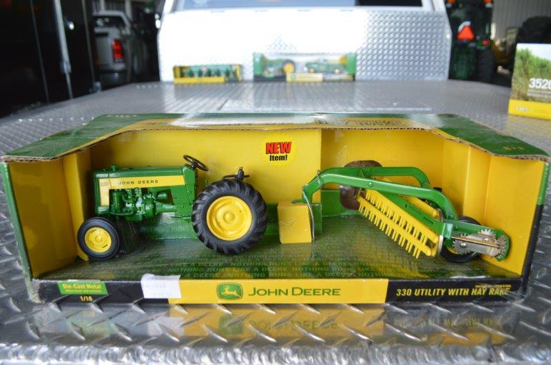 JD 330 Utility w/ hay rake, 1/16 scale, new in box