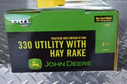 JD 330 Utility w/ hay rake, 1/16 scale, new in box