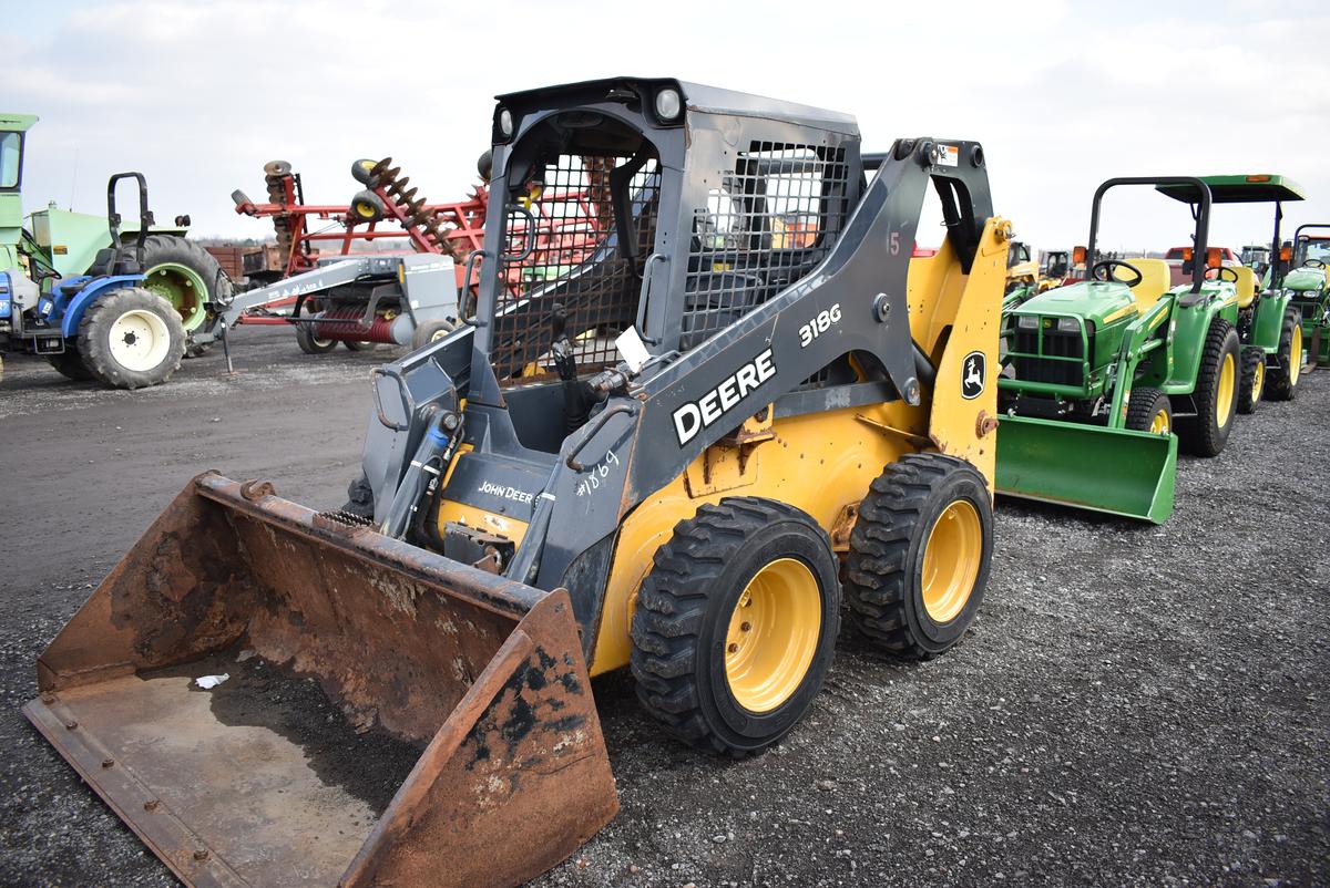 JD 318G skid loader w/ 7,016hrs, 2spd, hyd quick att, aux hyd, hand & foot controls, sells w/ 70'' m