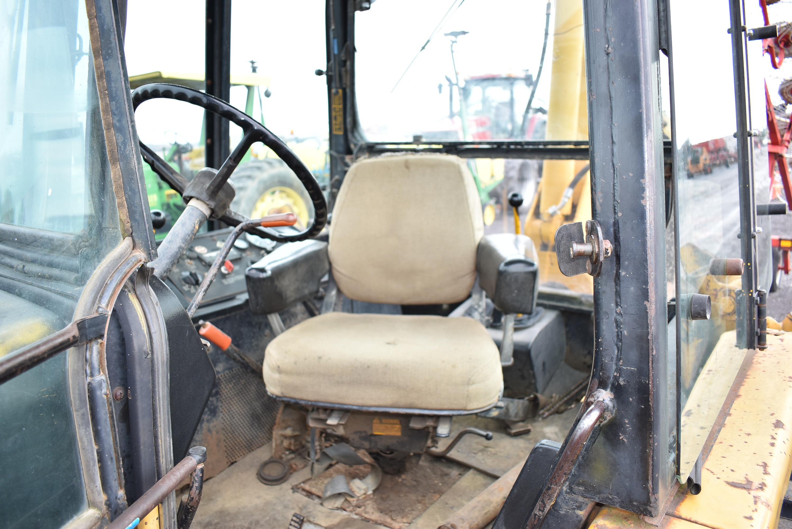 JD 410C backhoe w/ 3293hrs, 4wd, 24" digging bucket, outriggers, extendahoe, 21L-24 rear rubber , ne