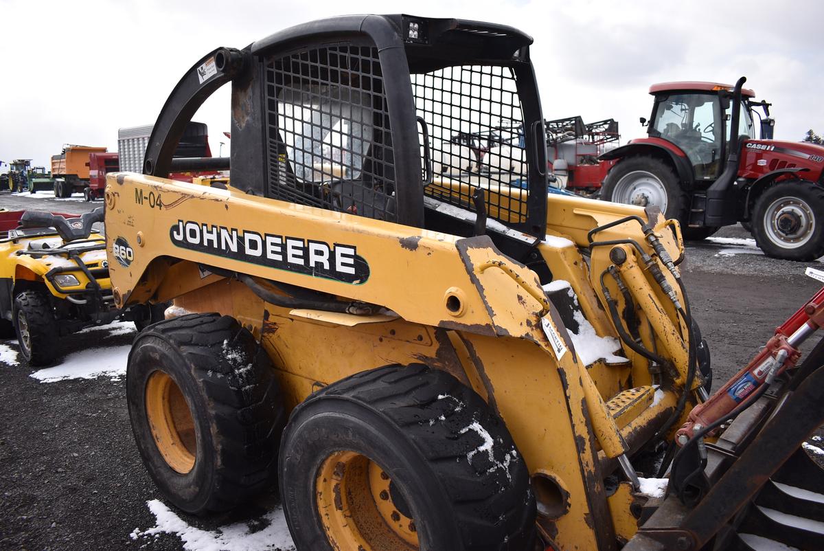 JD 260 skid loader showing 2674hrs, aux hyd, manual quick att, hand & foot controls, 14x17.5 tires (