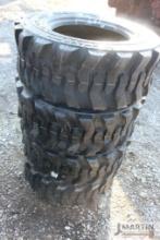 Set of 4- 12-16.5NHS skid loader tires